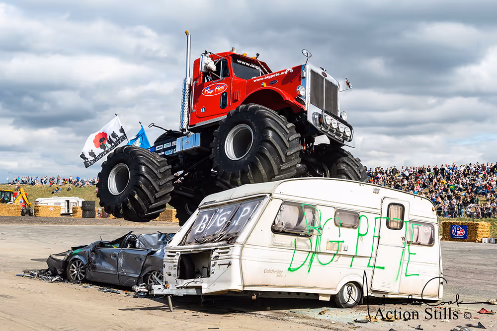 Big Pete on top of a caravan with "Big Pete" painted on it