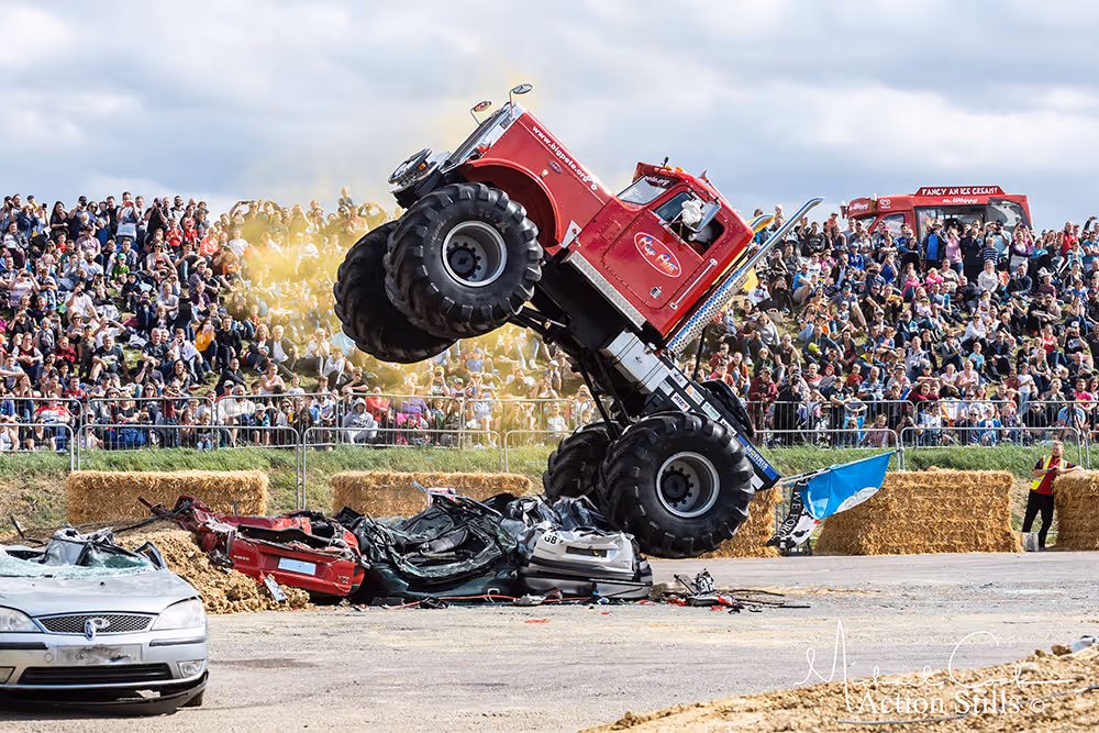 Big Pete rearing up over a pile of crushed cars