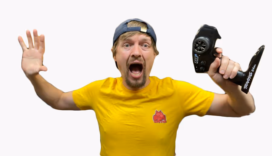 Kevin Talbot, driver of Game Over, holding a remote control